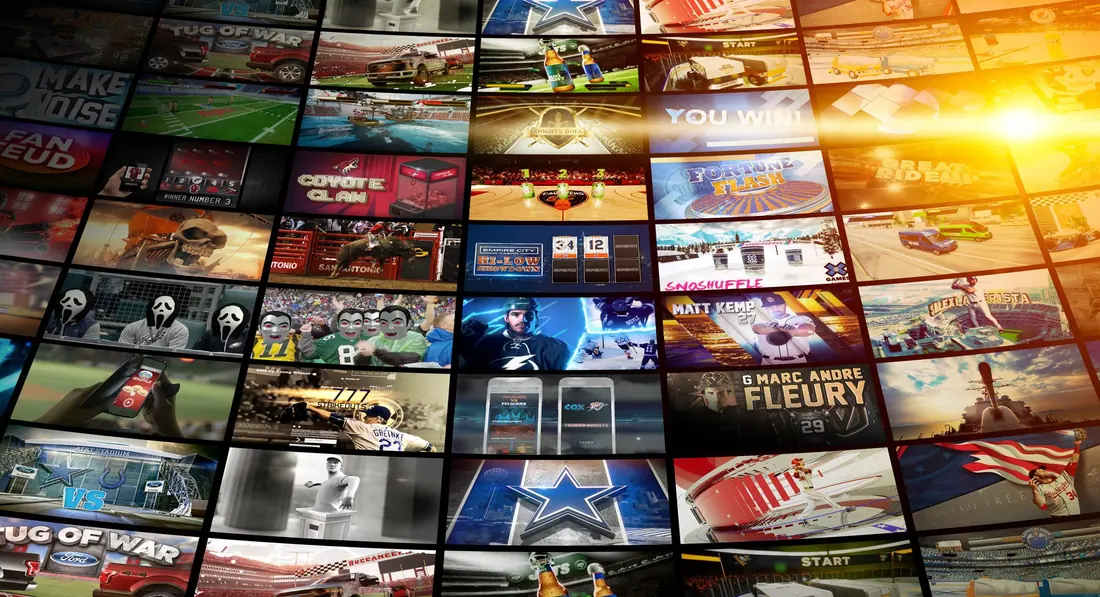 Wall of stadium game screens